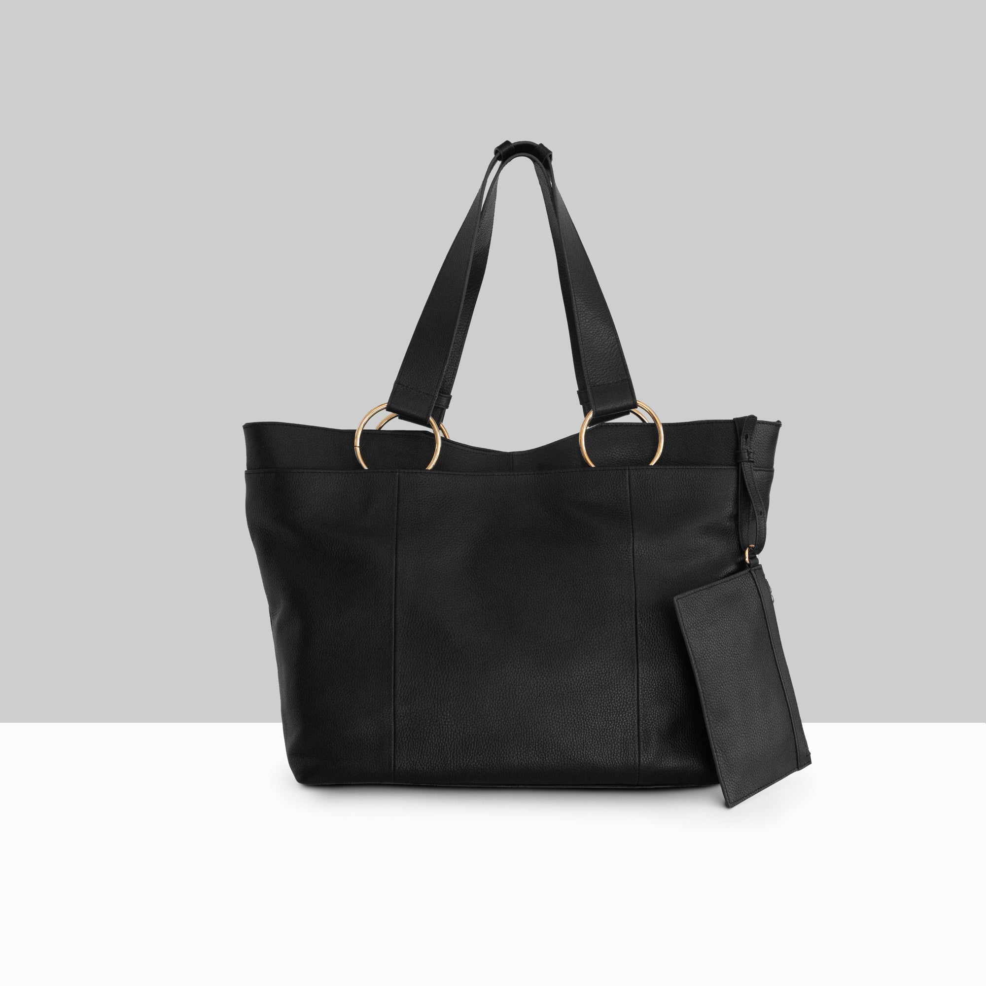 Lodis Solaris Tote in Black – Straight Front View, Drum Dyed Pebbled Leather with Double Handles, Gold-Tone Ring Hardware and Matching Zip Pouch | Lodis 1965