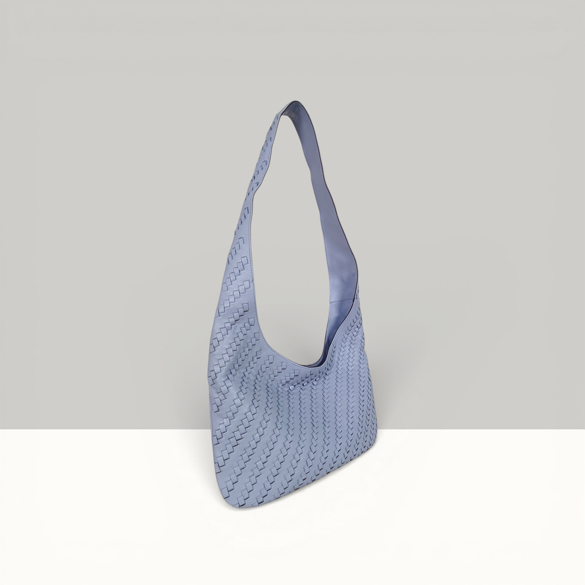 Lodis Solstice Hobo in Aura – Side Profile View, Full Woven Pebbled Leather Texture and Single Shoulder Strap | Lodis 1965
