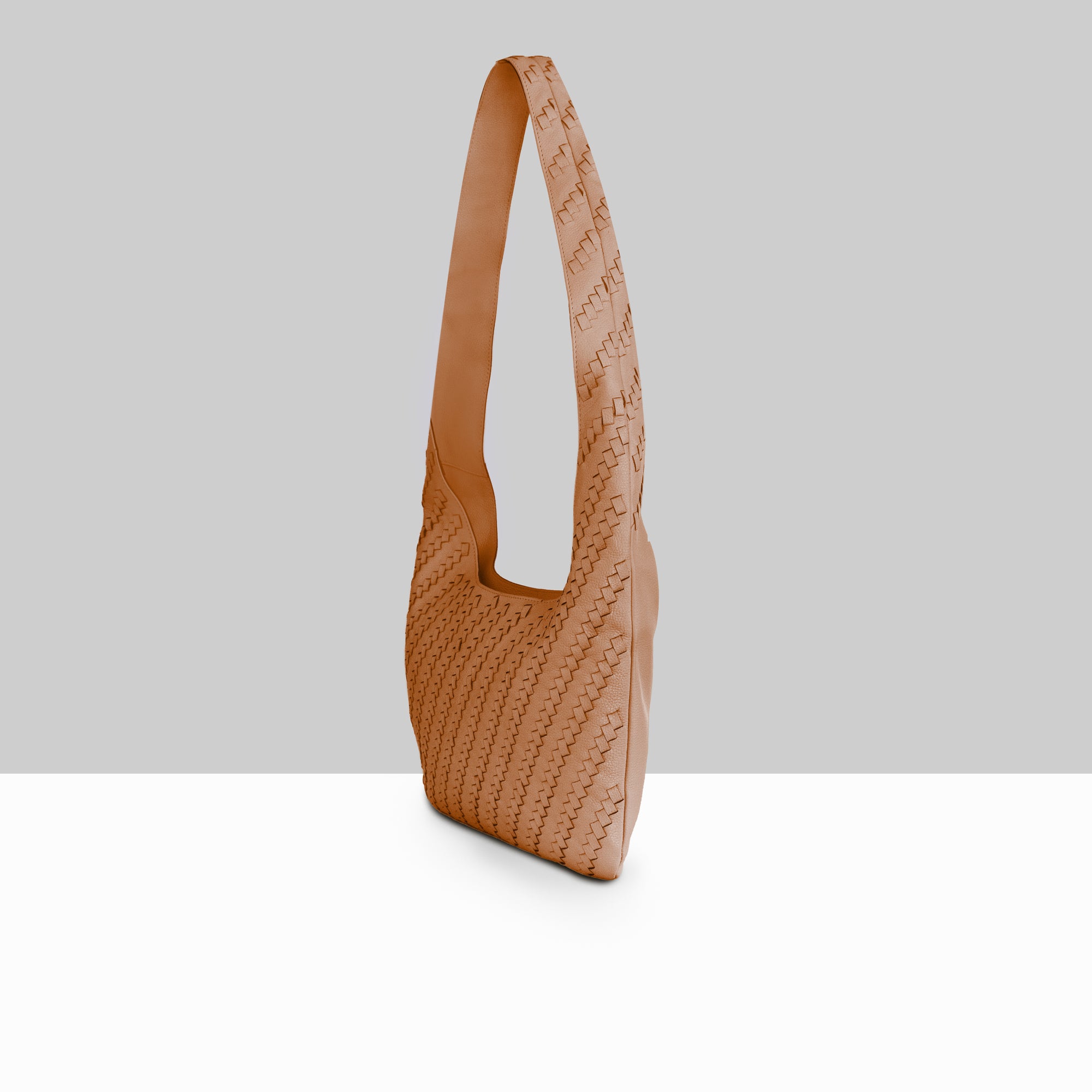 Lodis Solstice Hobo in Chestnut – Side Profile View, Full Woven Pebbled Leather Texture and Single Shoulder Strap | Lodis 1965