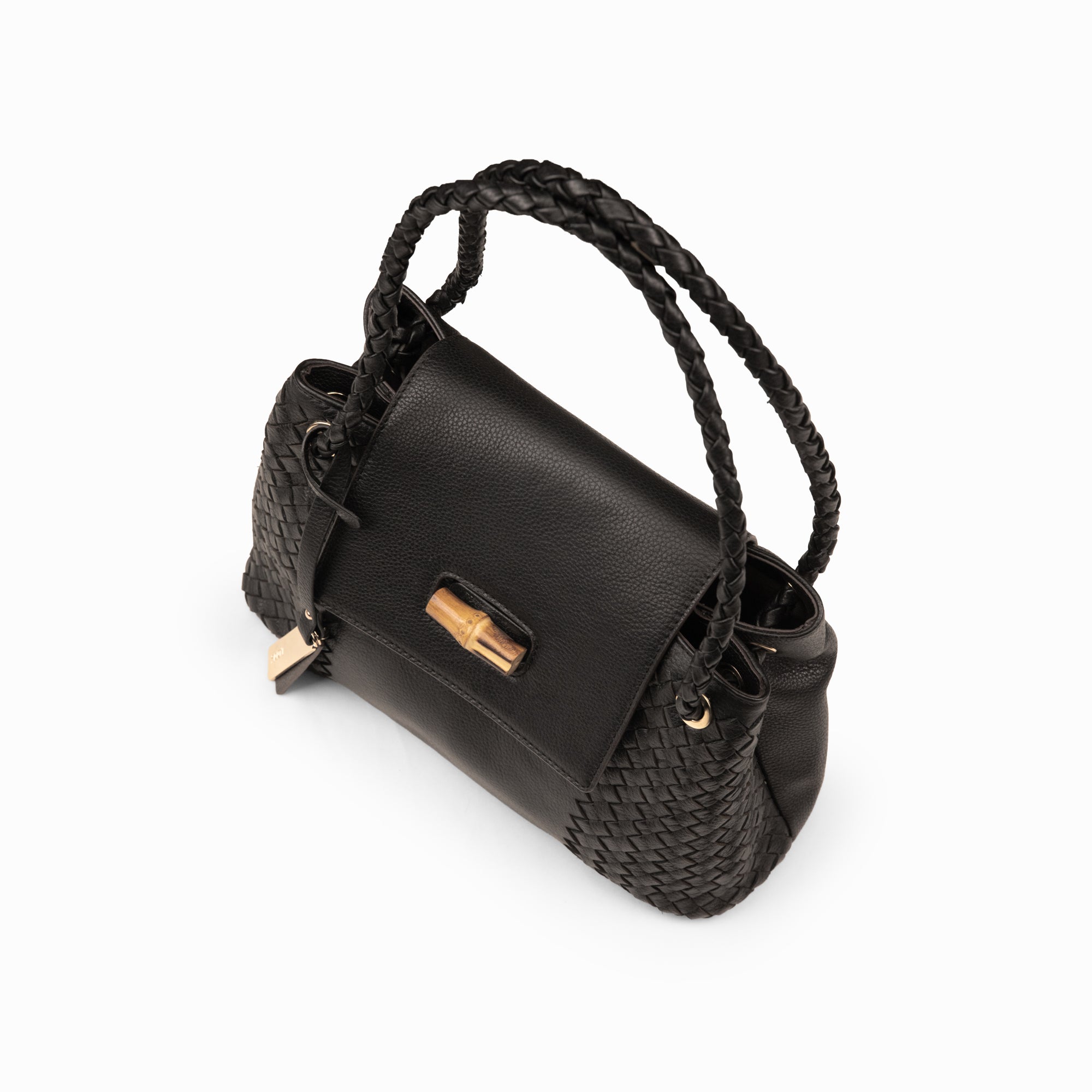 Lodis Sondra Satchel in Black – Angled Front View, Drum Dyed Pebbled Leather with Braided Top Handle and Gold-Tone Turn-Lock Clasp | Lodis 1965