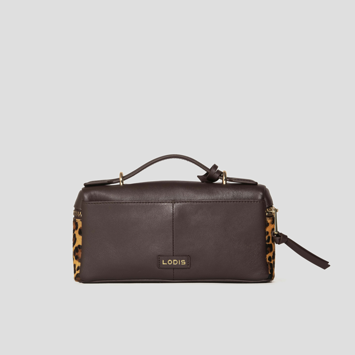 Lodis Stratos Texas Crossbody in Cheetah Print - Back View Showing Dark Brown Texas Leather Panel with Gold Foil Lodis Logo and Top Handle | Lodis 1965