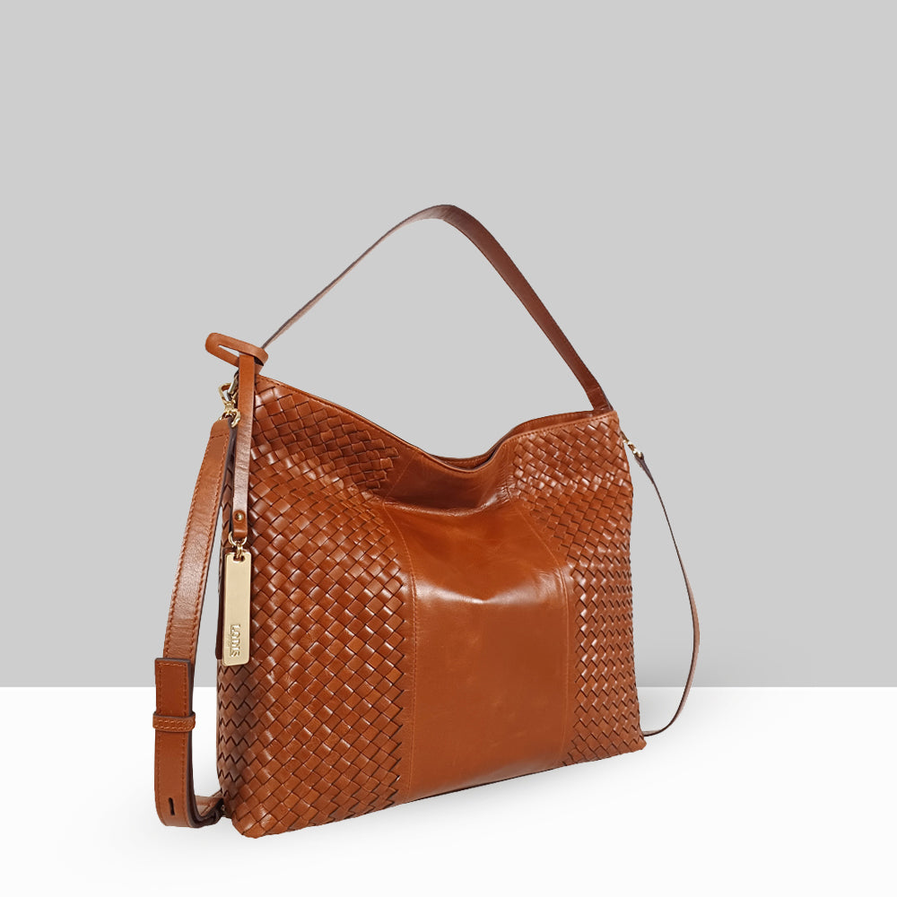 Lodis Venice Hobo in Chestnut – Side Profile View, Polished Woven Genuine Leather with Gold-Tone Logo Tag and Adjustable Crossbody Strap | Lodis 1965