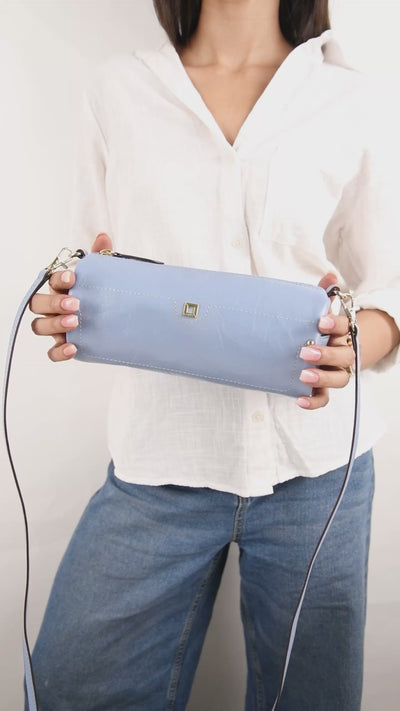 Overglow Barrel Sling in Aura Blue Patent Leather – Video Showing How to Wear as Crossbody, Strap Adjustment, and Interior Layout | Lodis 1965