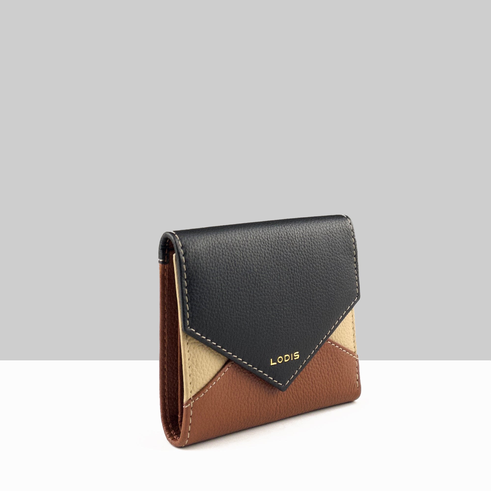Lodis Vista Envelope Small Tri Fold Wallet in black sand chestnut color block pebbled leather with Lodis logo – side angle view